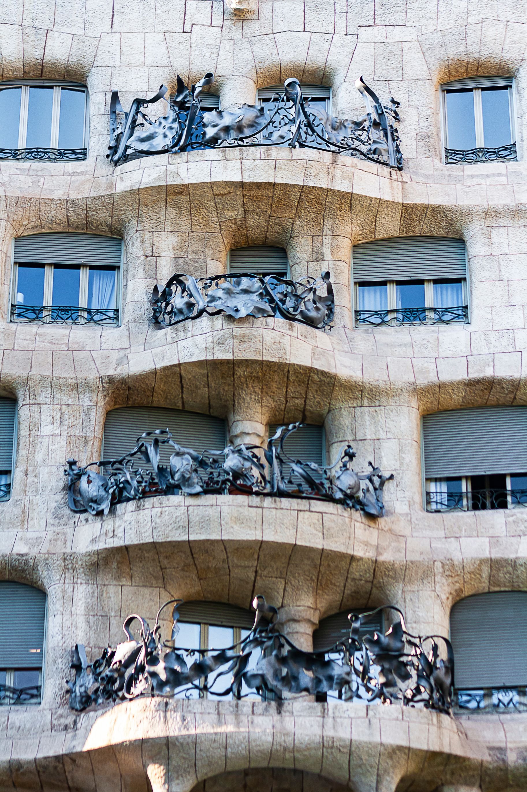 Passeig de Gràcia with Gaudí's Casa Batlló / La Pedrera facade and elegant streetscape