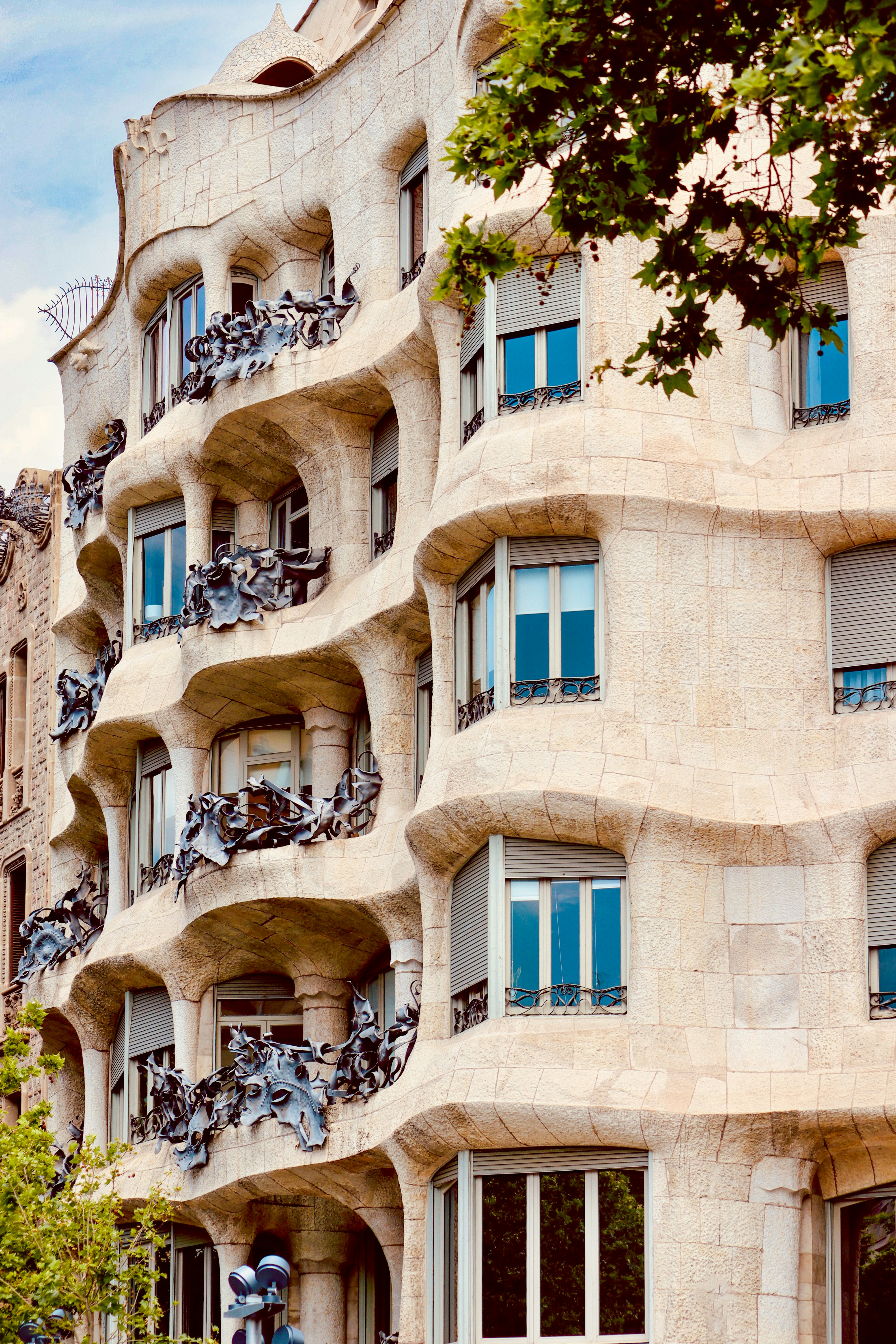 Casa Batlló facade or La Pedrera rooftop chimneys