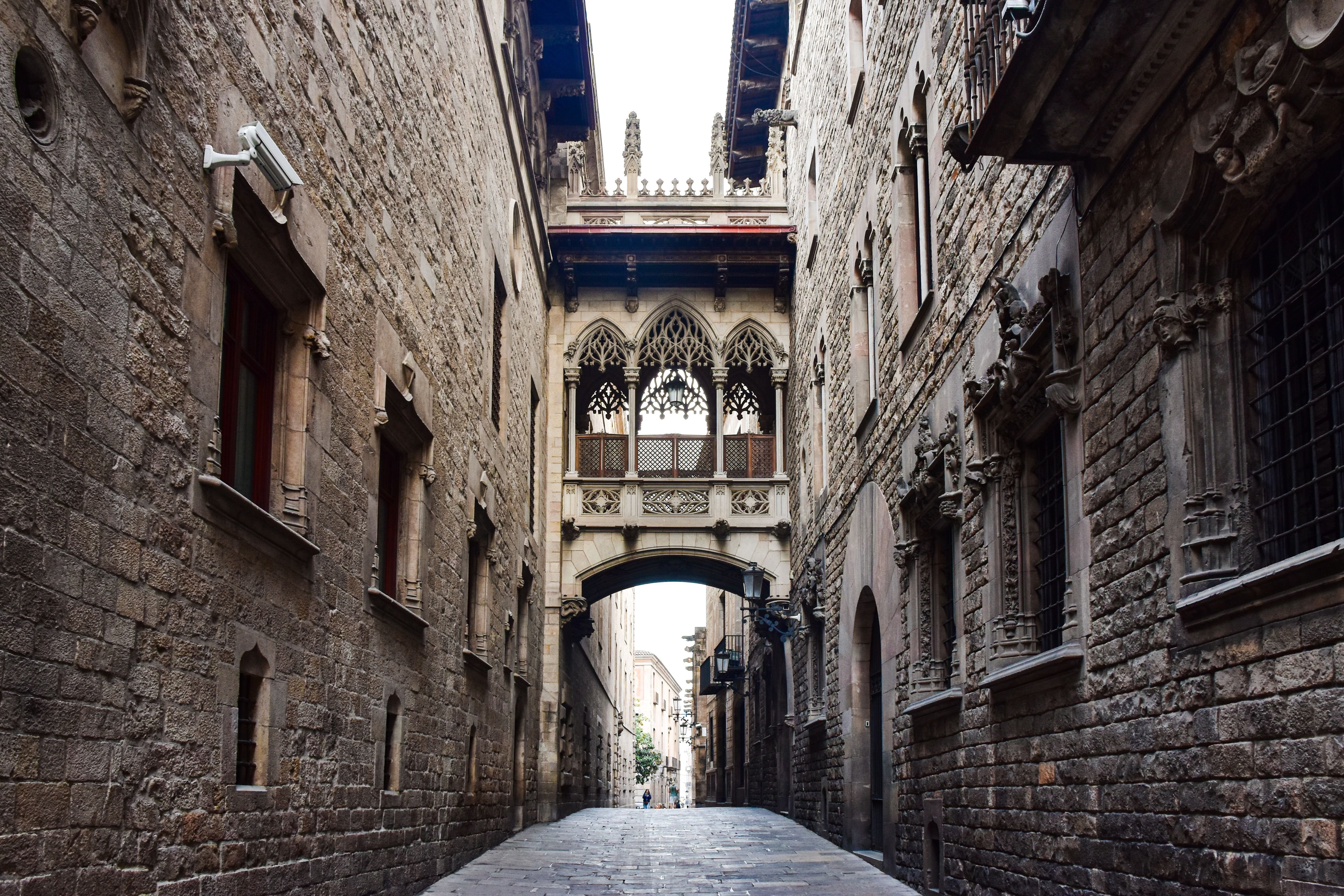 Barcelona Cathedral facade or the Pont del Bisbe neo-Gothic bridge