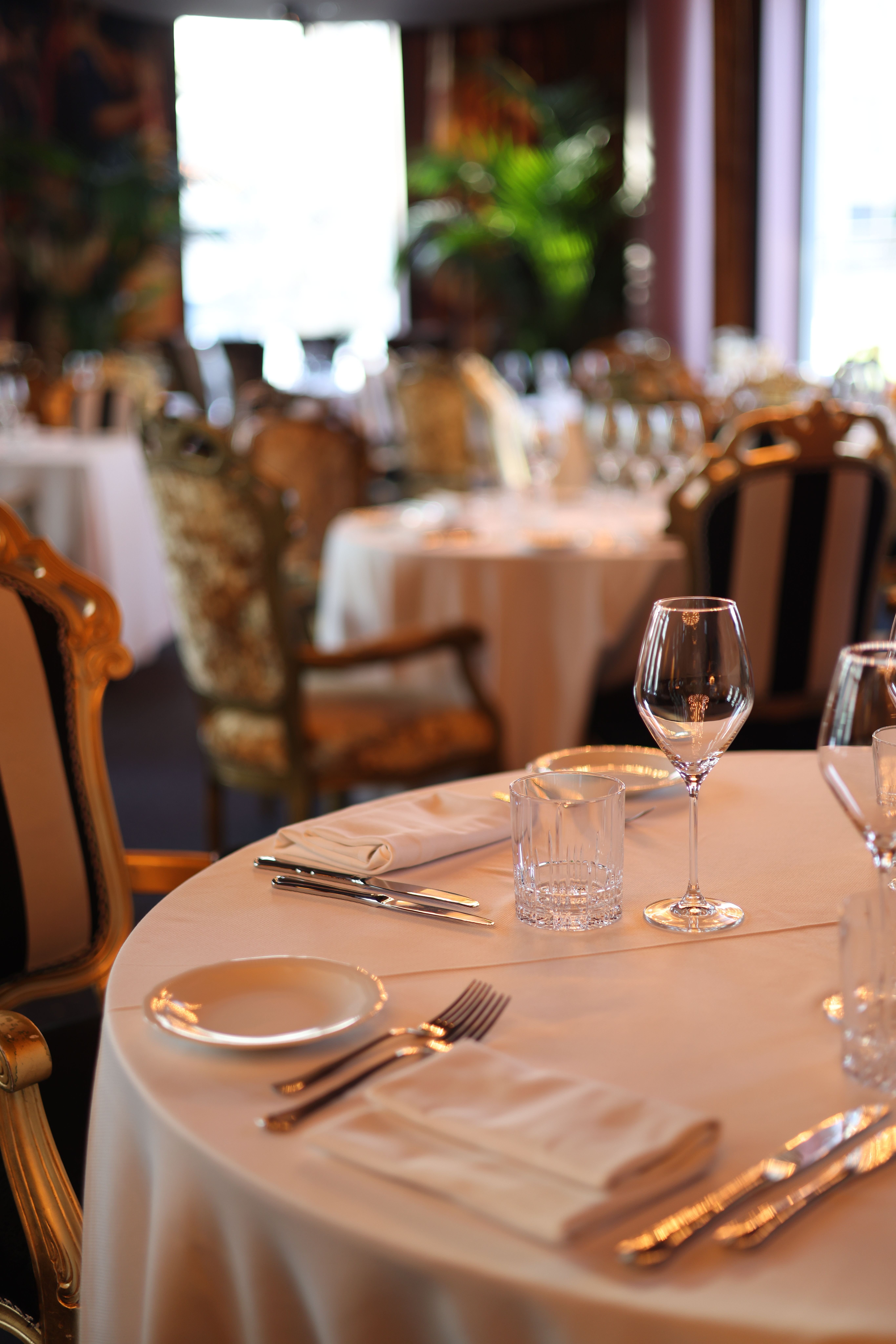 An opulent Barcelona hotel suite or a Michelin-style hotel dining room