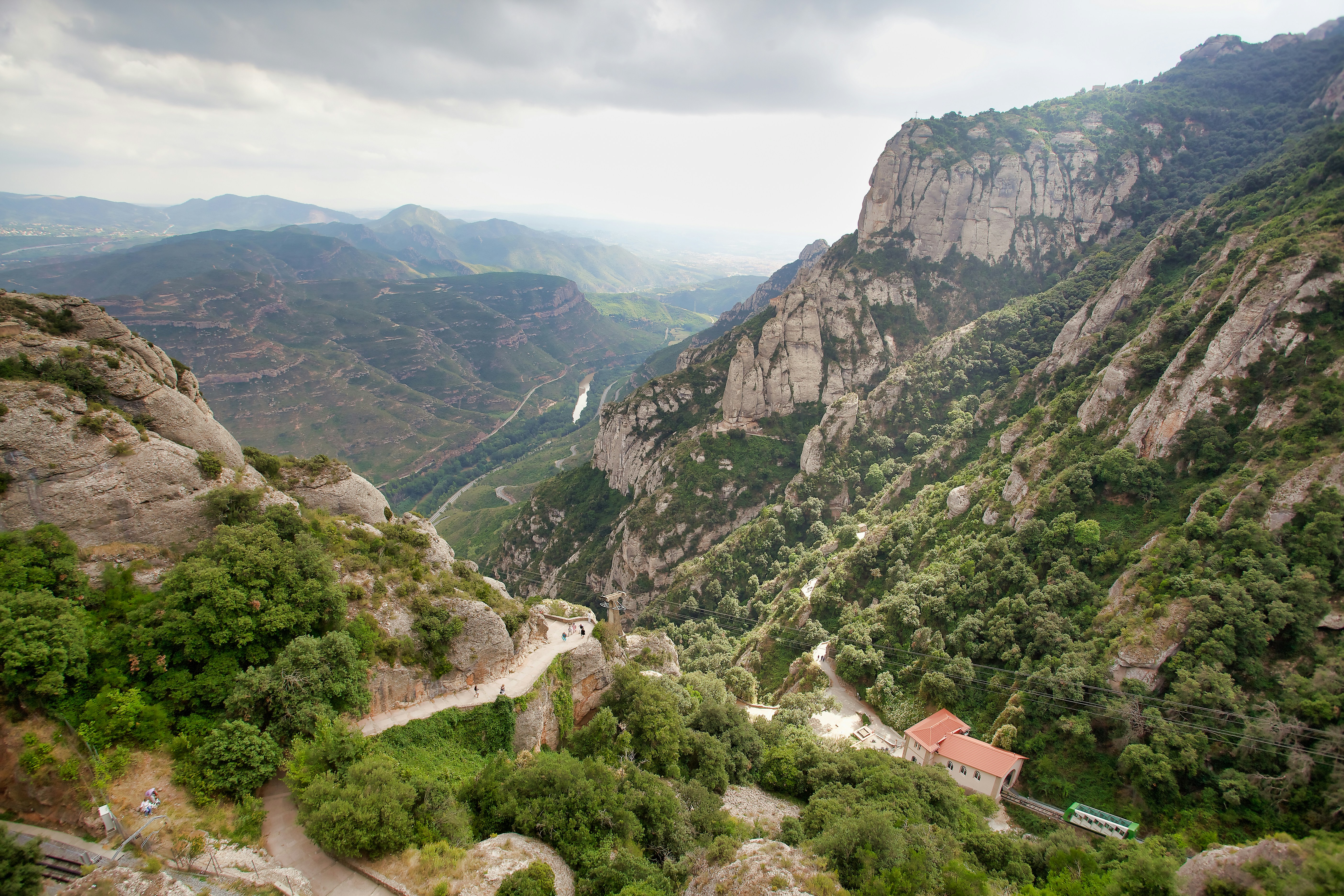Hiking trail among the Montserrat rock formations, or the monastery from a viewpoint