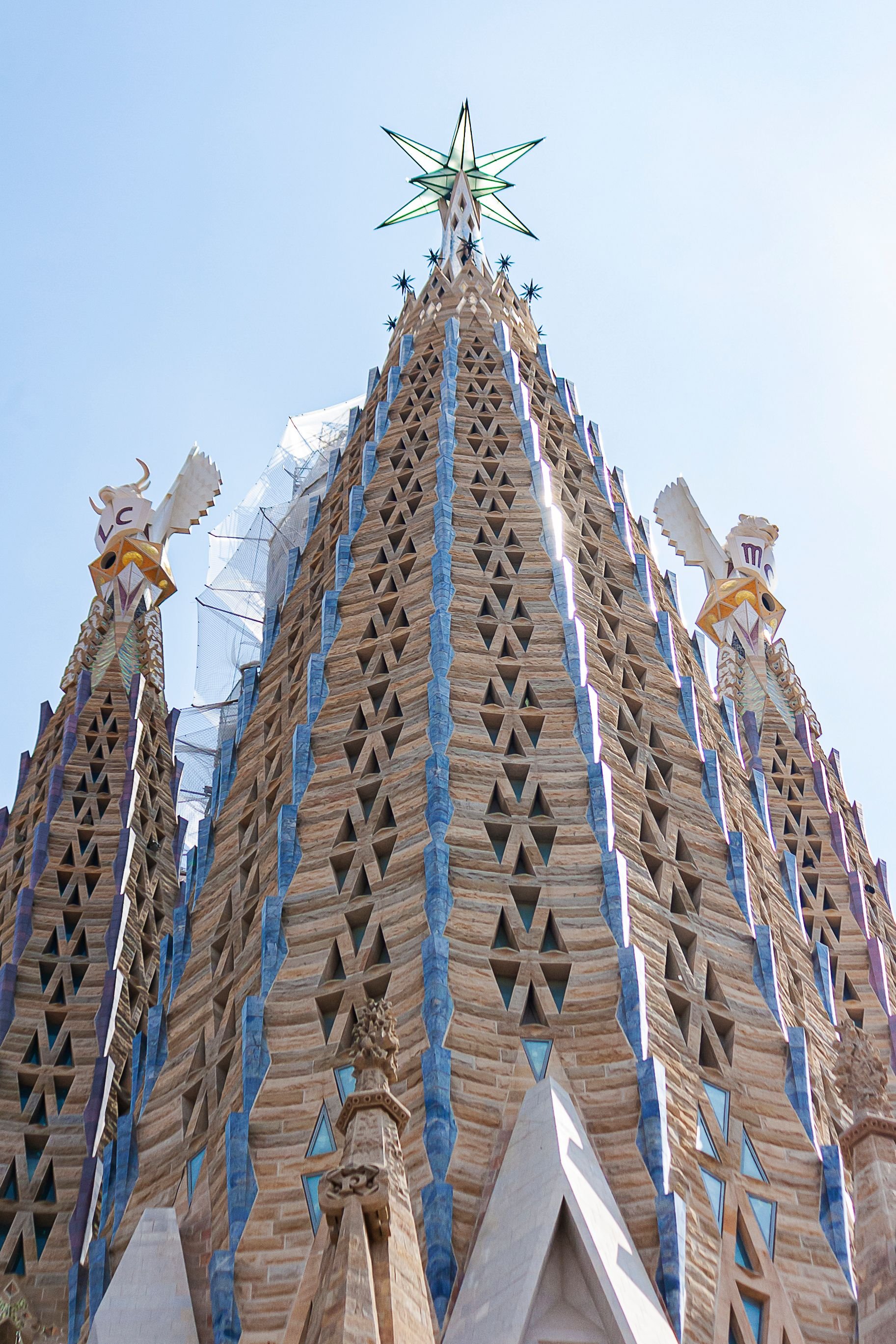 Sagrada Família's full tower silhouette showing the completed central Tower of Jesus Christ