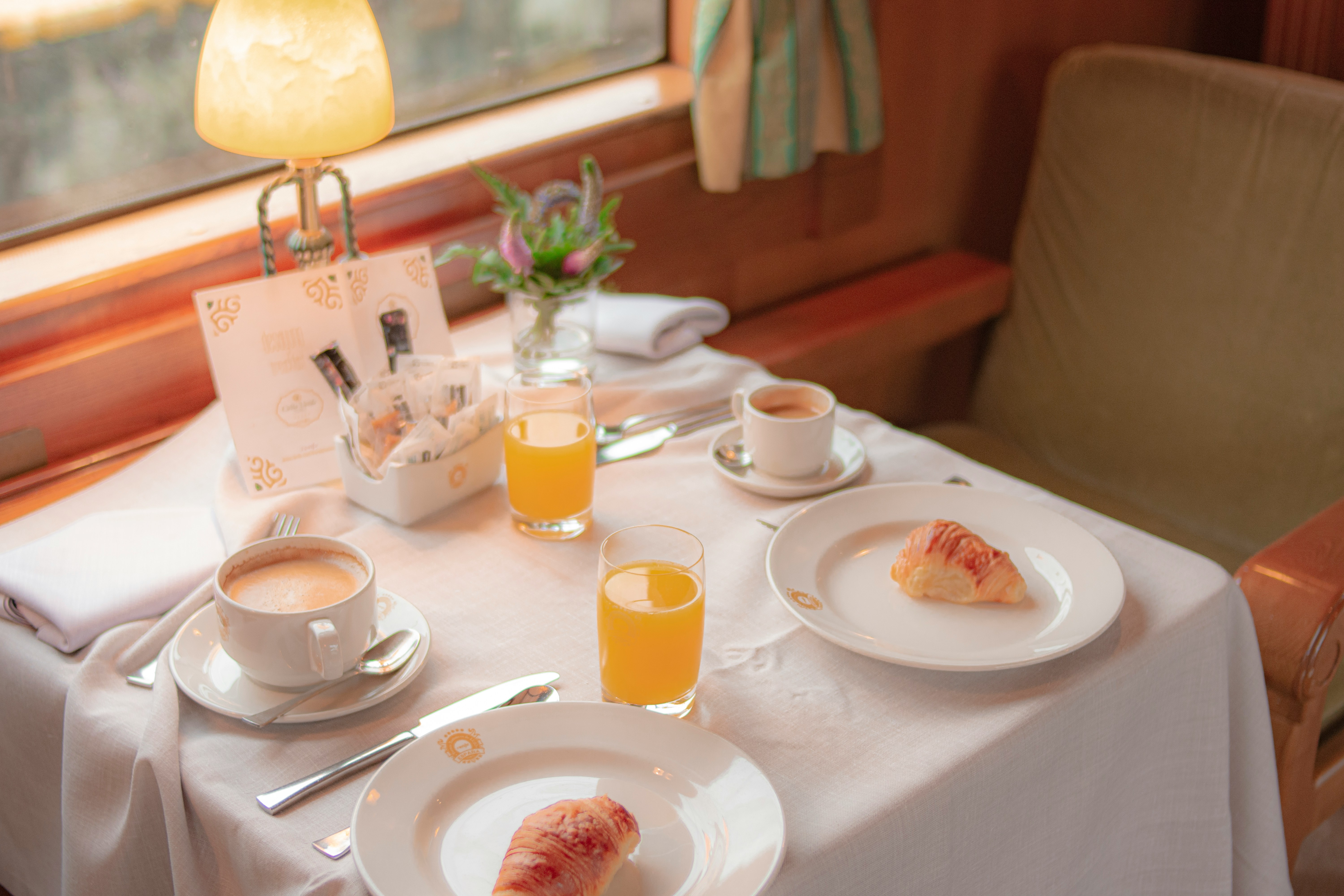 Train interior / first-class cabin, or the departures board at Barcelona Sants