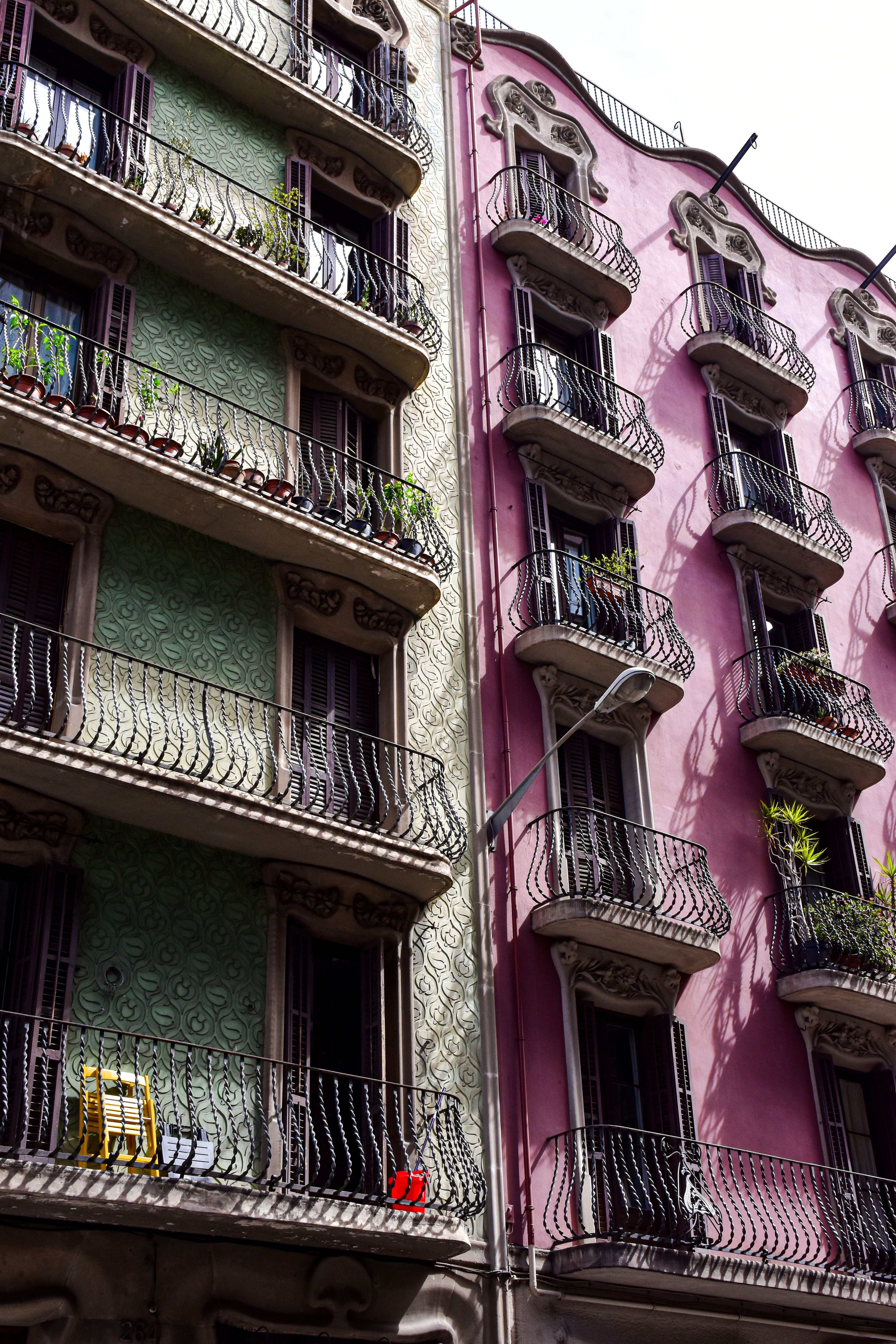 A boutique hotel street scene in El Born or a classic Eixample facade with balconies