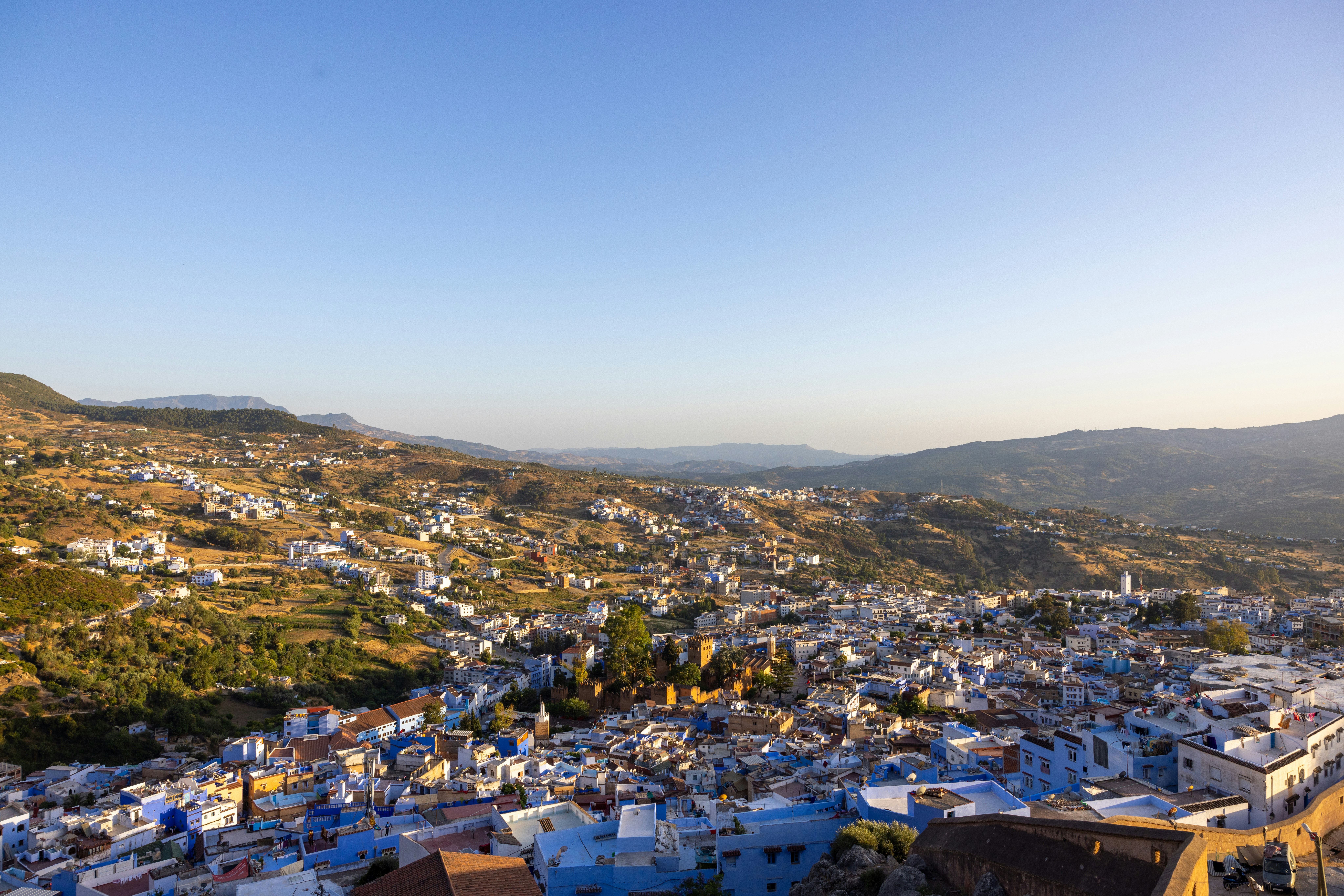 View over the blue rooftops of Chefchaouen from the Spanish Mosque at sunset