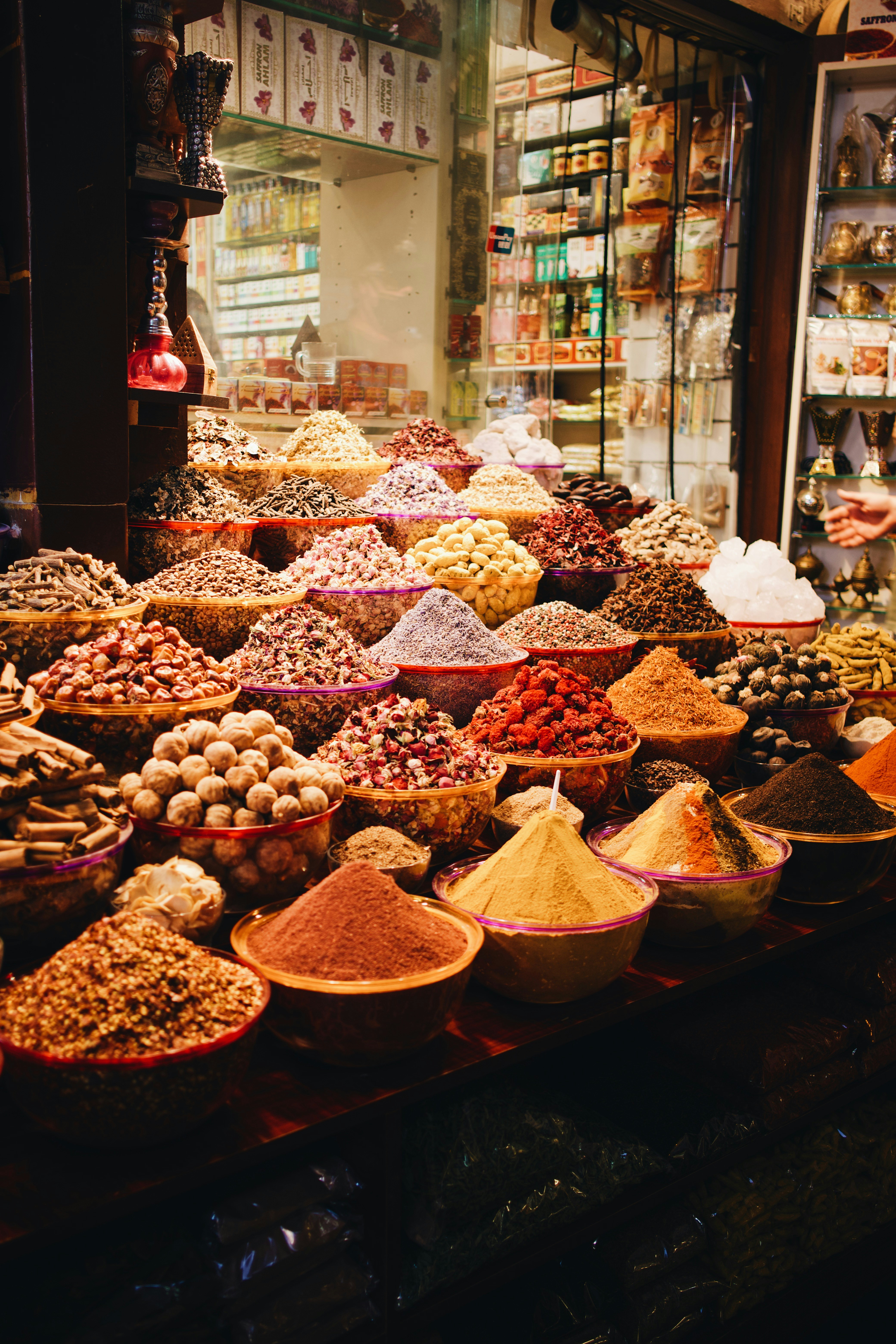 A spread of Moroccan street food and mint tea on a market table