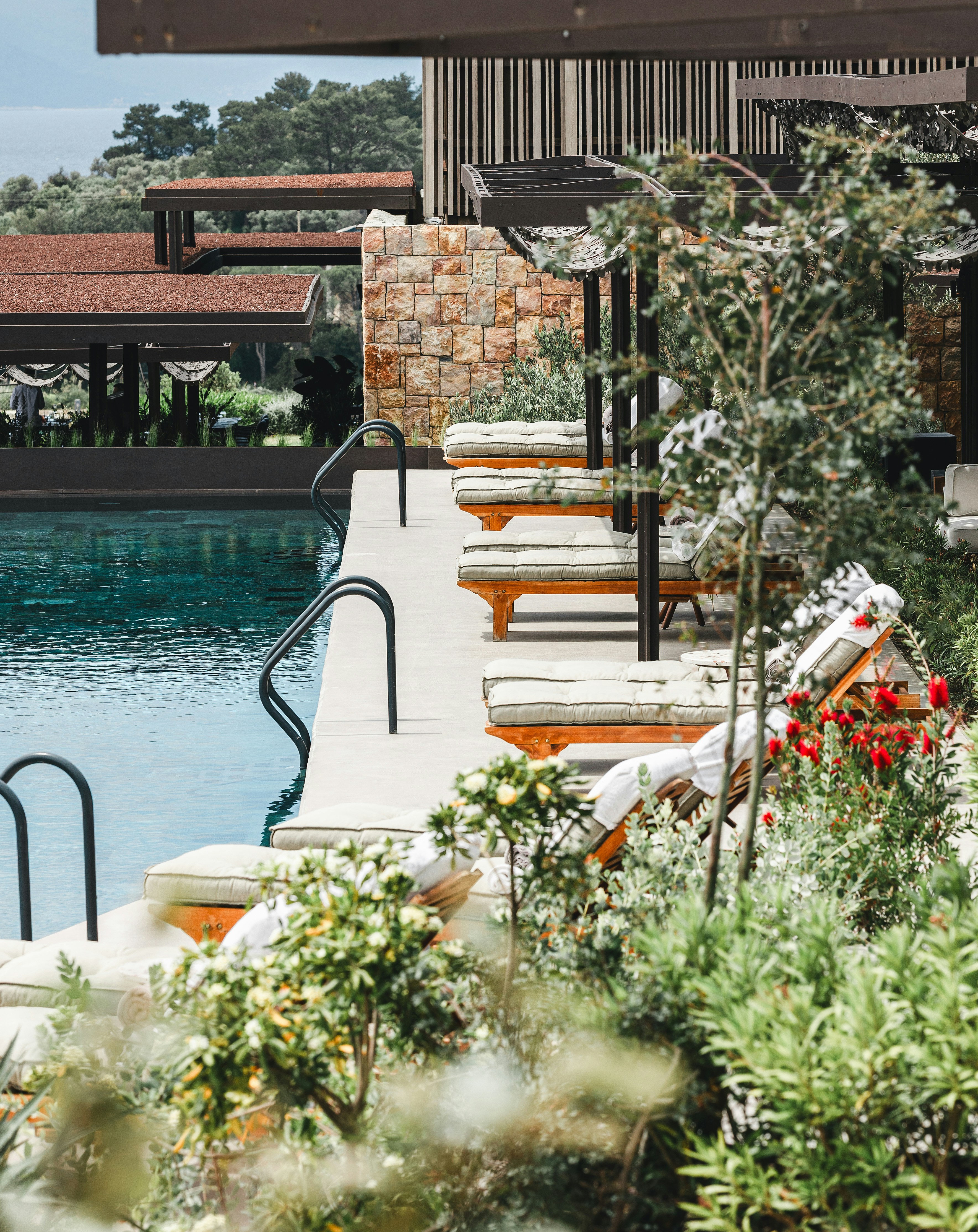 A large beachfront all-inclusive resort pool overlooking the Mediterranean on the Turkish Riviera, no recognizable faces