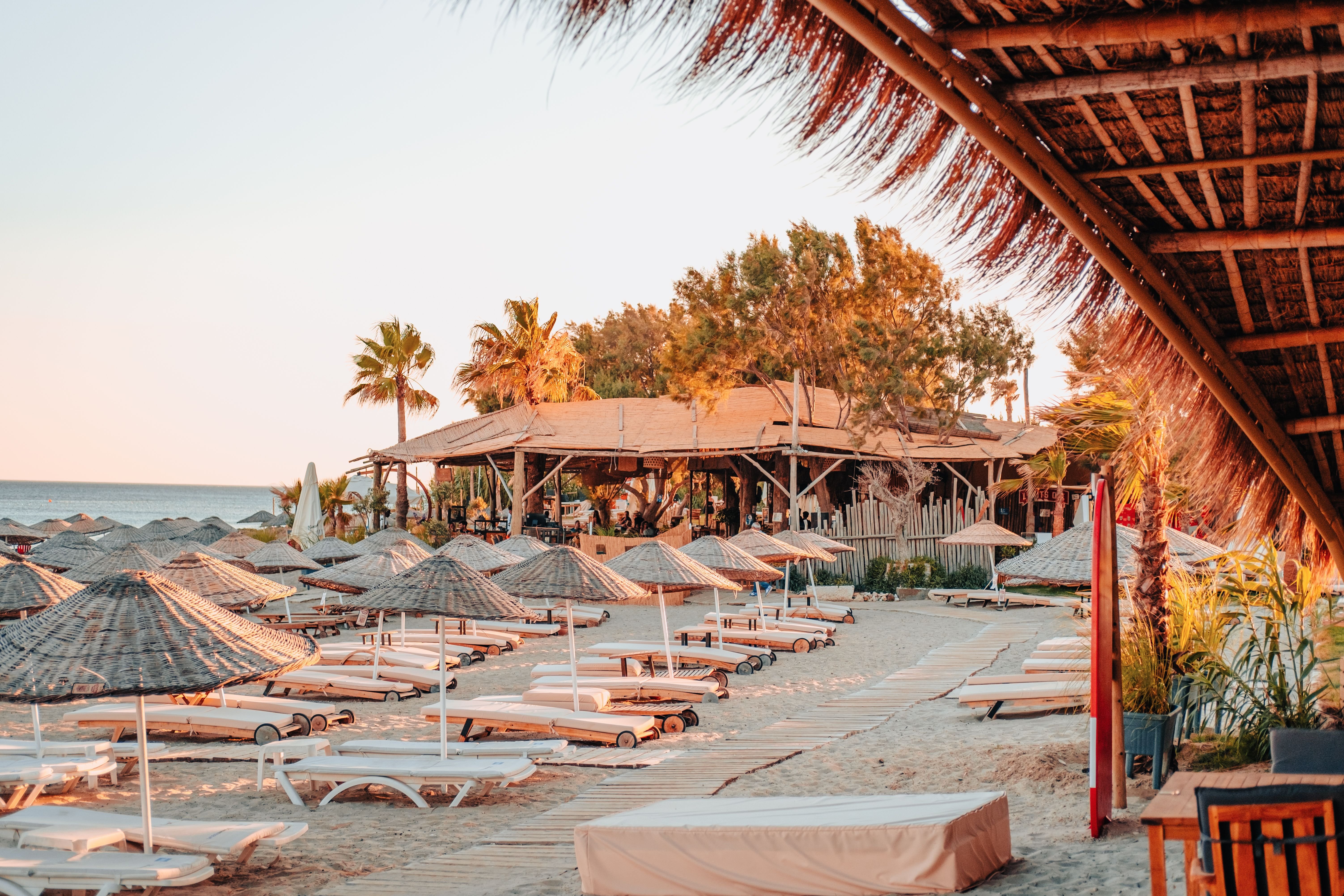 A resort beach with loungers and umbrellas on the Turkish Mediterranean coast