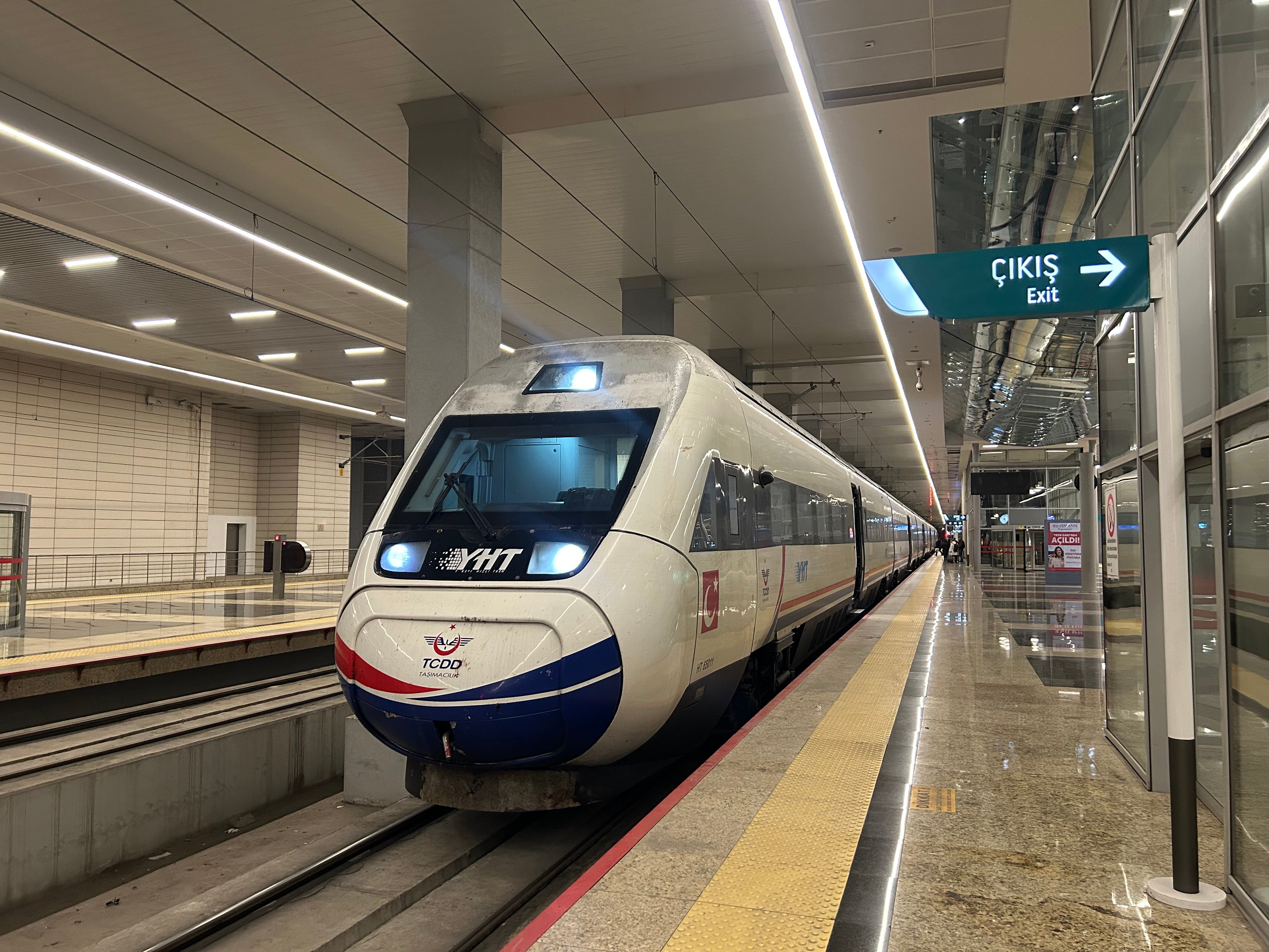 A Turkish intercity scene — a modern train, bus, or domestic plane, no recognizable faces