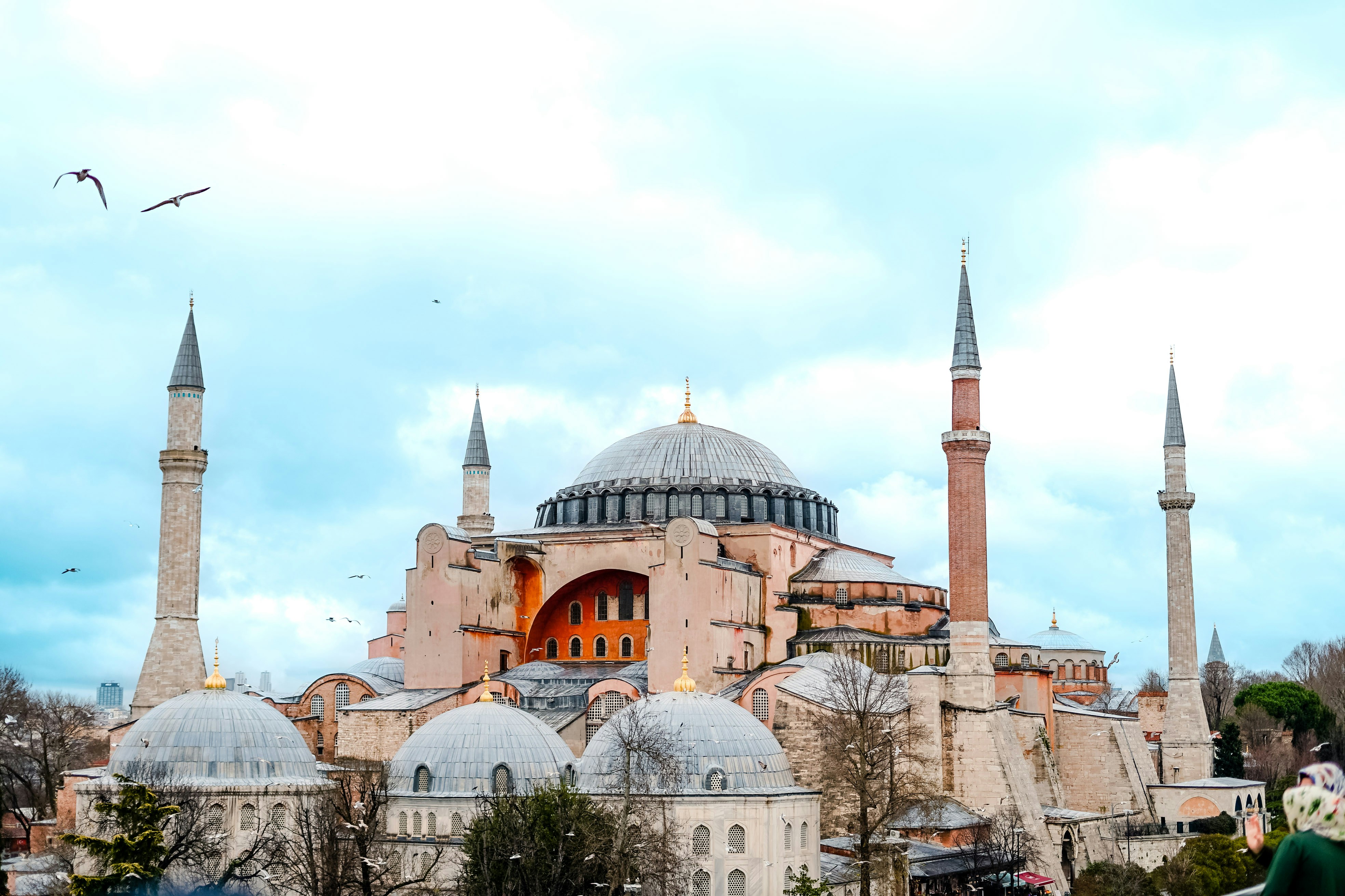 Hagia Sophia and the Blue Mosque seen together across Sultanahmet Square at dusk