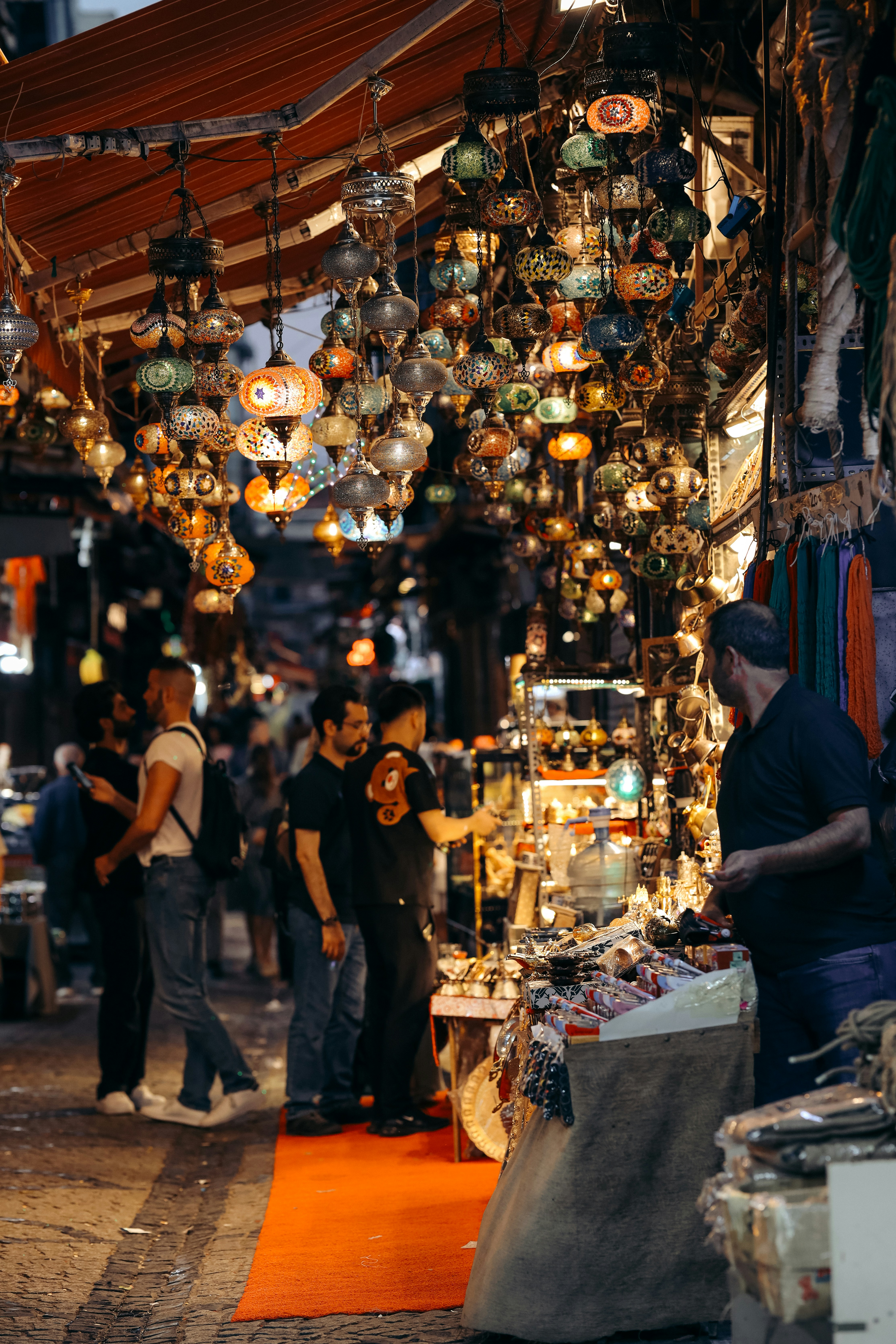 A relaxed, busy tourist scene in a safe Turkish setting like Istanbul's old city, no recognizable faces