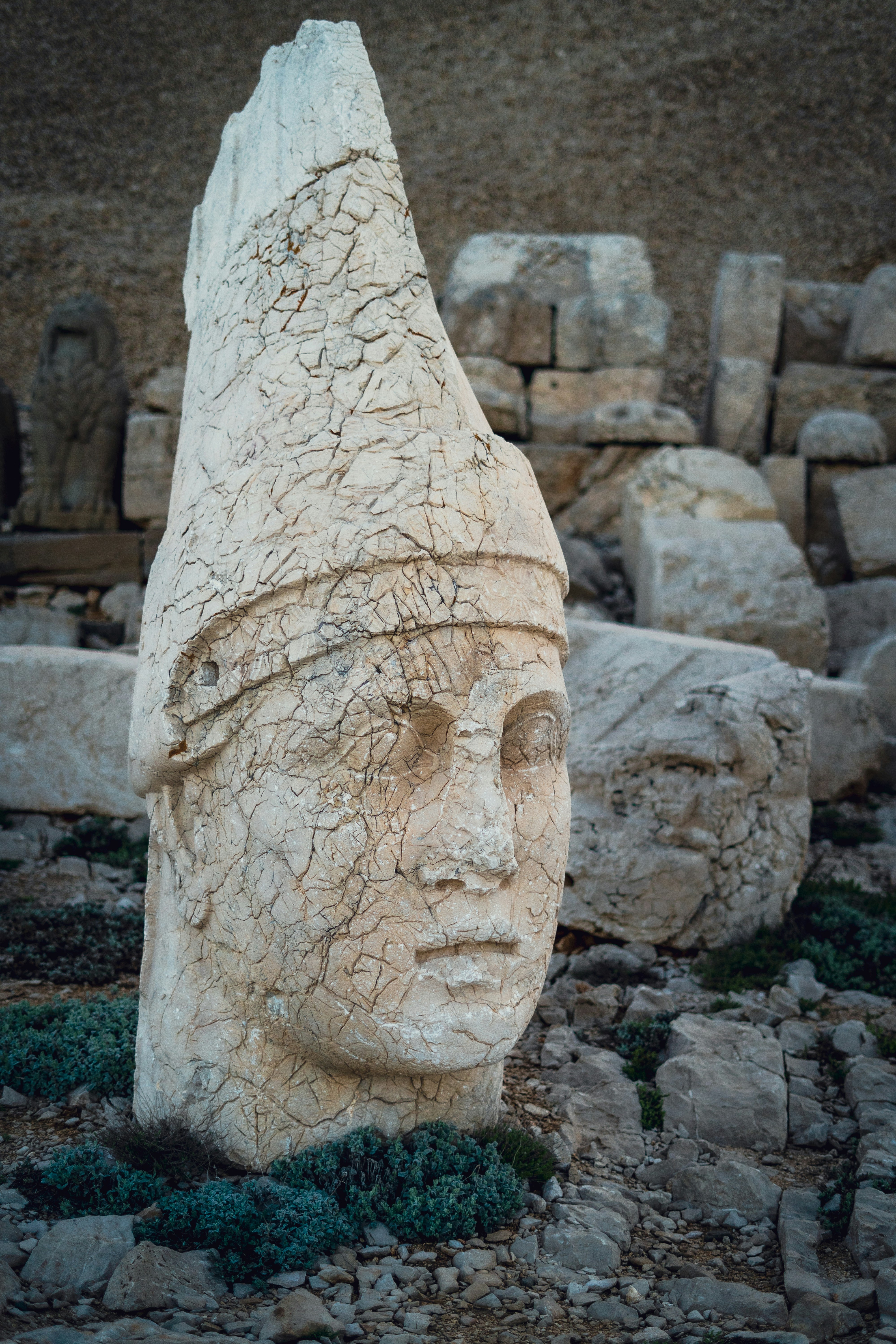Wide view of the statue terraces of Mount Nemrut with the summit tumulus behind
