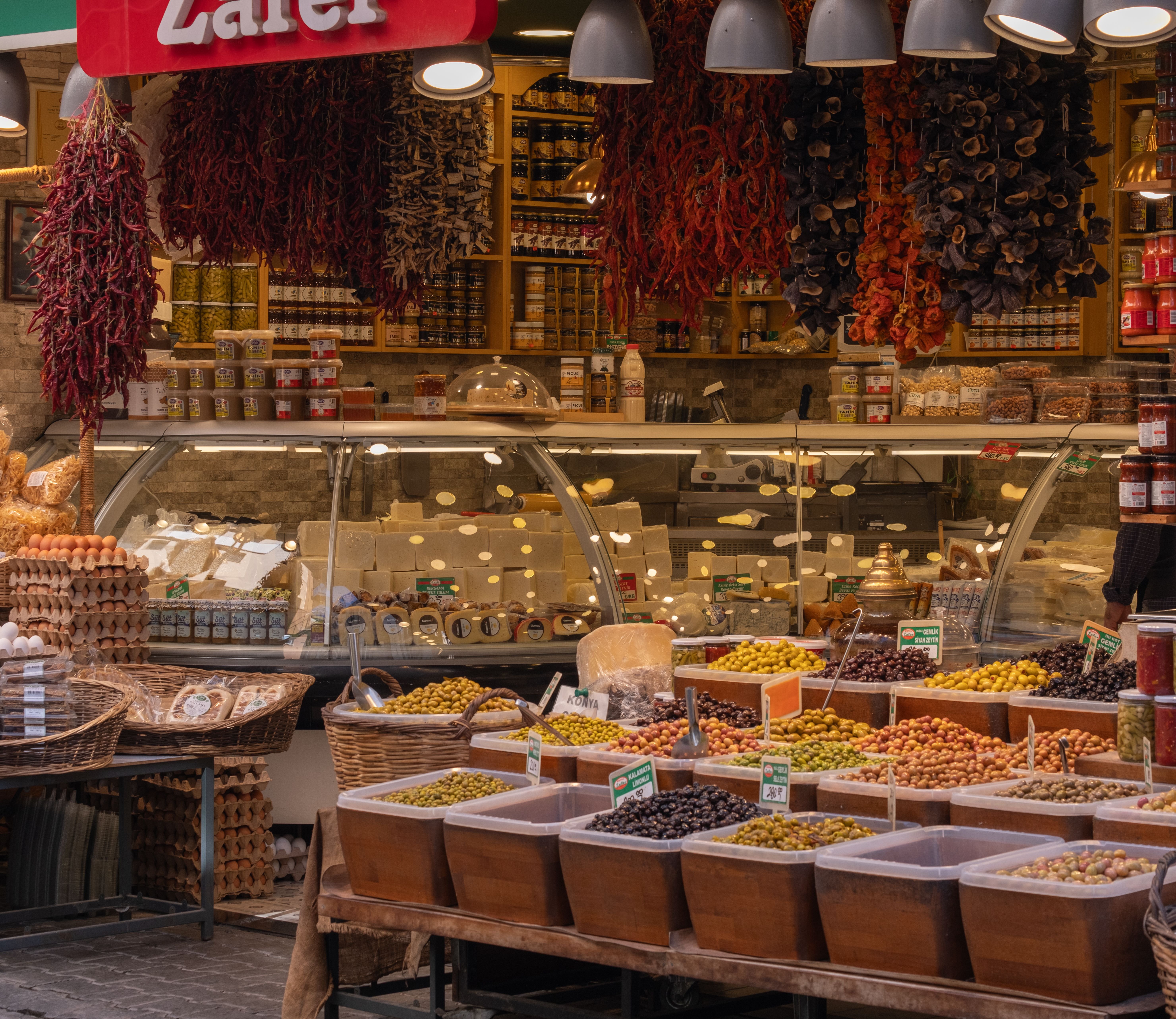Bottled water and fresh Turkish food on a table, healthy-travel feel, no recognizable faces
